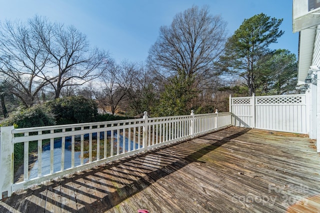 531 Elm St, Salisbury, NC 28144 - wooden terrace featuring fence and view of wooded area