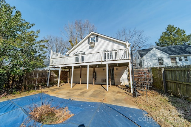 531 Elm St, Salisbury, NC 28144 - rear view of house featuring a wooden deck, stairway, a fenced backyard, and a patio