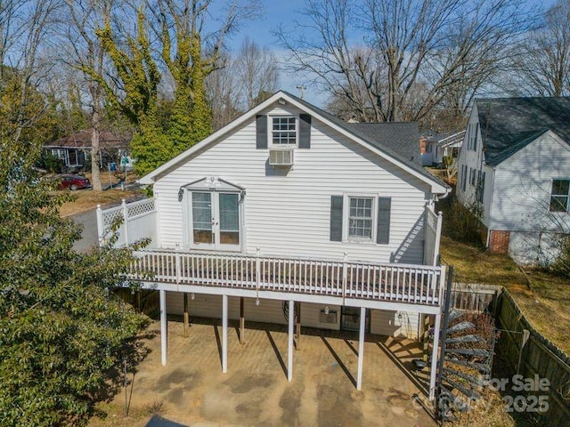 531 Elm St, Salisbury, NC 28144 - back of house with a wooden deck, french doors, and a carport