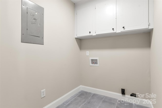 2525 Oxford Cir, Lancaster, SC 29720 - clothes washing area with washer hookup, electric panel, and cabinets
