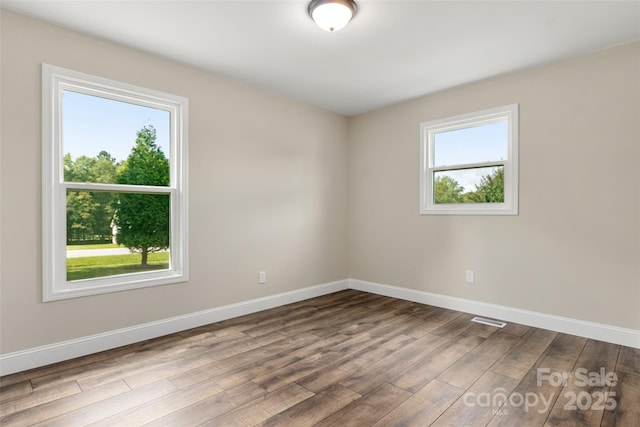 2525 Oxford Cir, Lancaster, SC 29720 - spare room featuring hardwood / wood-style floors
