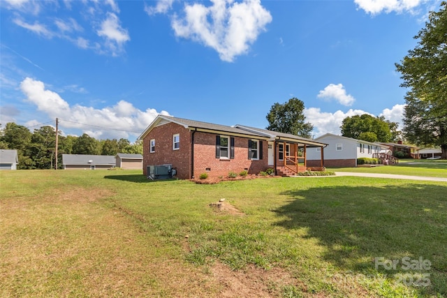 2525 Oxford Cir, Lancaster, SC 29720 - view of front facade with a front yard, covered porch, and cooling unit