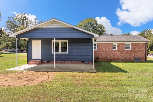 2525 Oxford Cir, Lancaster, SC 29720 - rear view of property with a lawn