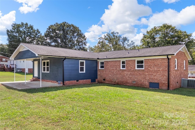 2525 Oxford Cir, Lancaster, SC 29720 - rear view of property featuring a lawn and a patio
