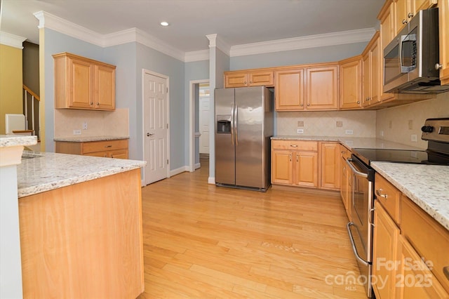 kitchen with crown molding, stainless steel appliances, light stone countertops, decorative backsplash, and light wood-type flooring