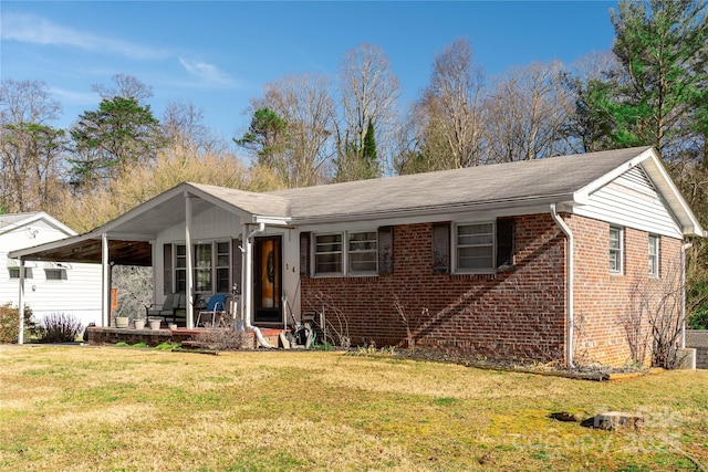 ranch-style home with a front yard