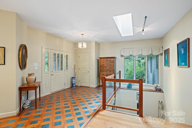 entryway with a skylight