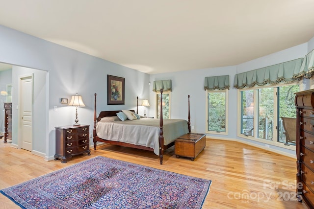 bedroom with wood-type flooring