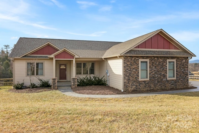 craftsman inspired home with a front yard