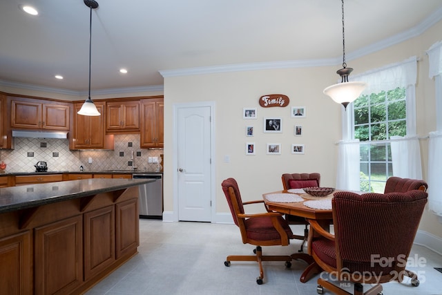 dining room featuring ornamental molding