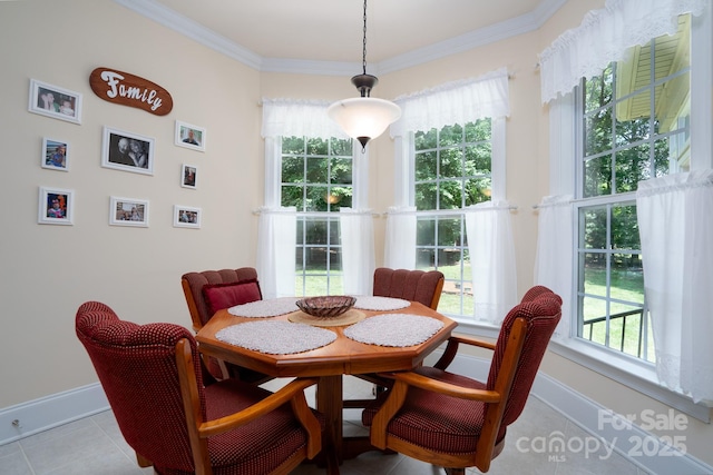 tiled dining room with ornamental molding