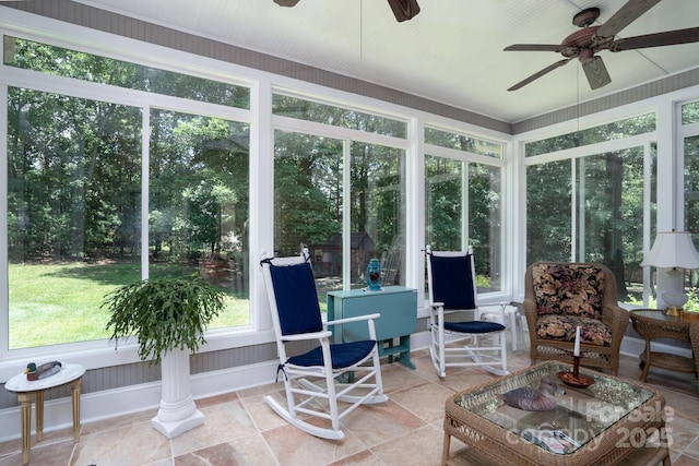 sunroom / solarium with ceiling fan