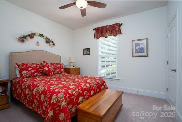 bedroom with light colored carpet and ceiling fan