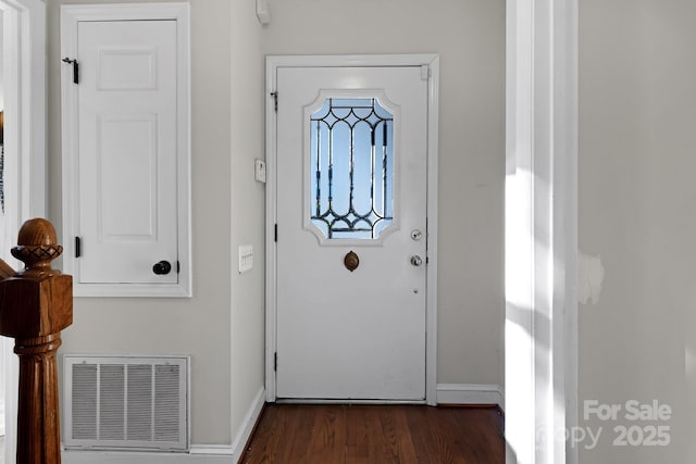 entrance foyer with dark hardwood / wood-style floors