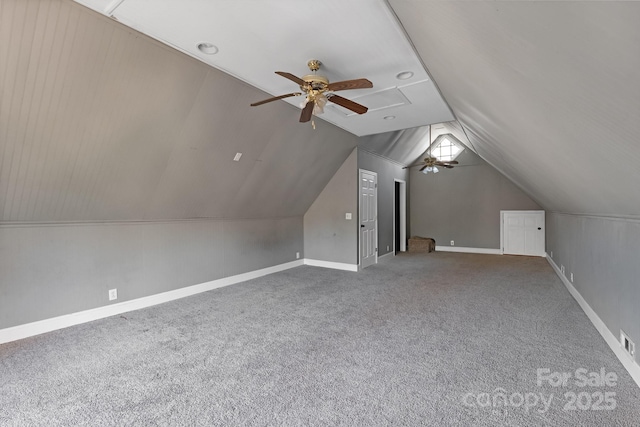 bonus room featuring lofted ceiling, ceiling fan, and carpet flooring