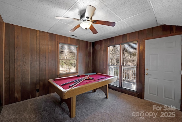 game room featuring ceiling fan, billiards, carpet, and wood walls