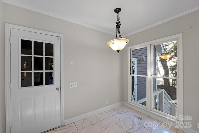 unfurnished dining area featuring crown molding