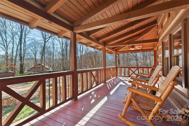 wooden deck with ceiling fan