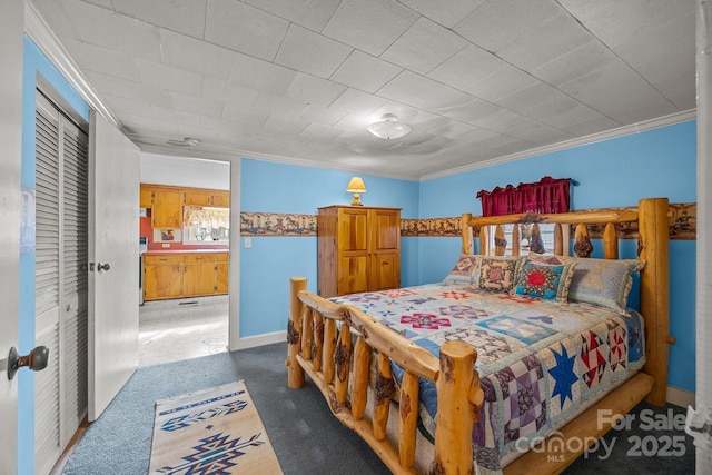 carpeted bedroom with crown molding