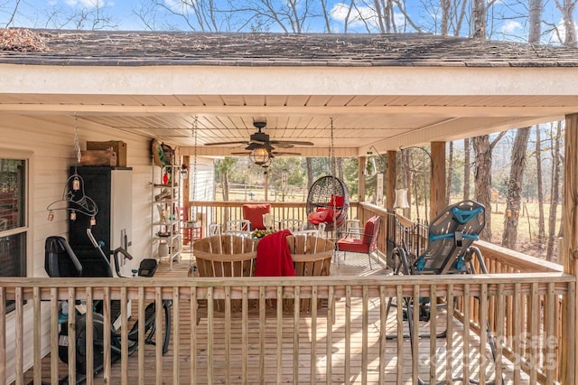 exterior space with ceiling fan