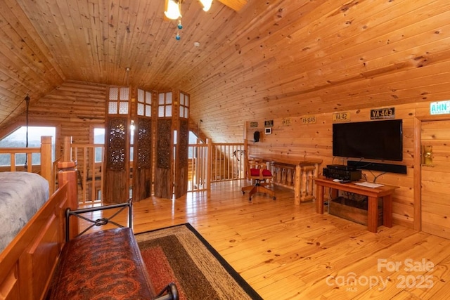 175 Owl Lookout Rd, Sylva, NC 28779 - bedroom with high vaulted ceiling, wooden walls, light wood-type flooring, and wooden ceiling