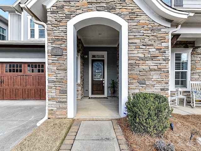 property entrance featuring a garage