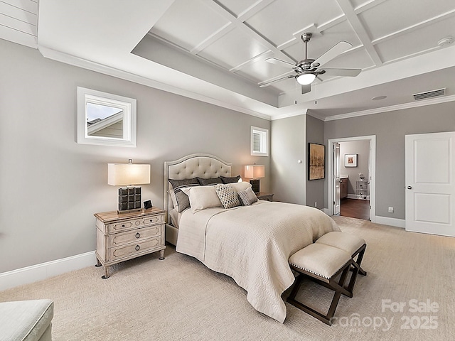 bedroom featuring ornamental molding, coffered ceiling, light carpet, and ensuite bath