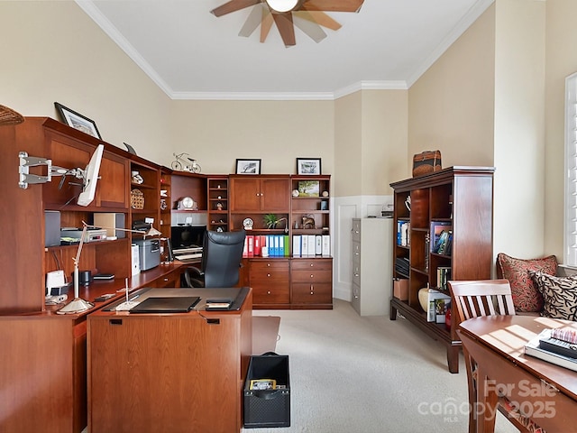 office featuring ceiling fan, light colored carpet, and crown molding