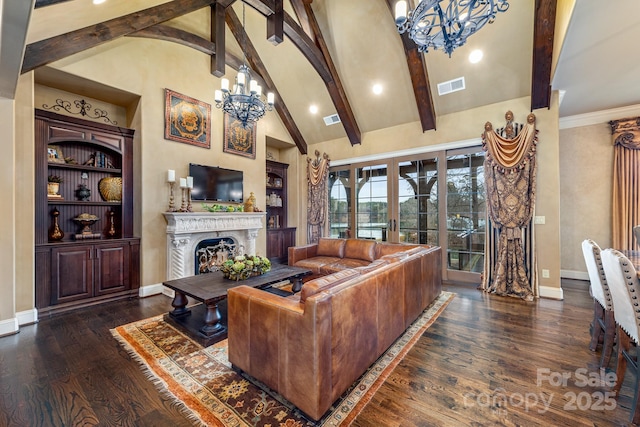 living room with dark hardwood / wood-style floors, built in features, high vaulted ceiling, beamed ceiling, and an inviting chandelier