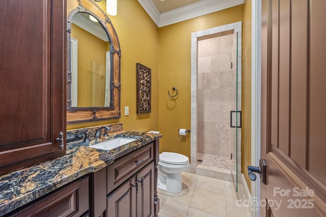 bathroom with a shower with shower door, ornamental molding, vanity, toilet, and tile patterned floors