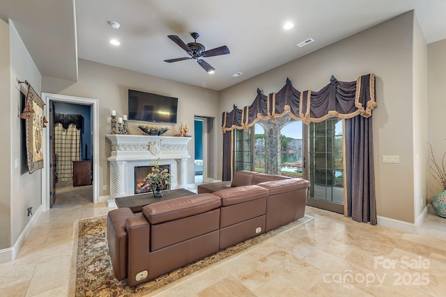 living room with ceiling fan