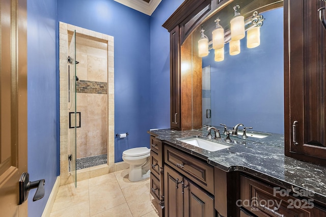 bathroom with tile patterned flooring, vanity, an enclosed shower, toilet, and crown molding