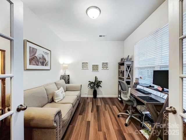 home office featuring hardwood / wood-style floors