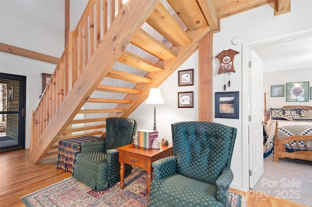 living area with hardwood / wood-style floors