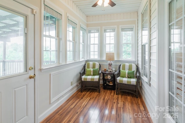 sunroom featuring a wealth of natural light and ceiling fan