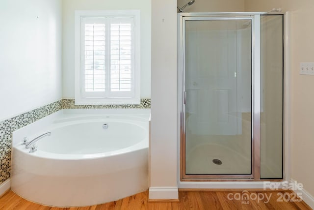 bathroom with independent shower and bath