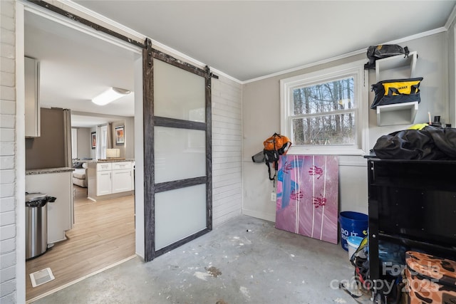 interior space with crown molding