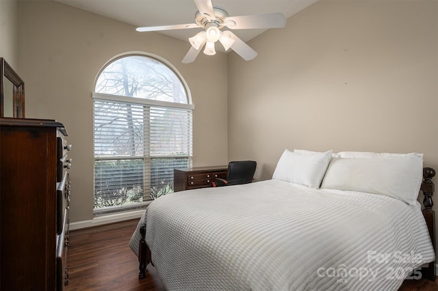 bedroom with a ceiling fan and wood finished floors