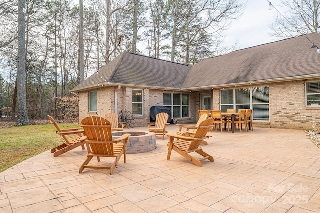 view of patio featuring a fire pit