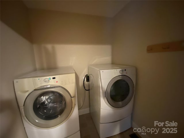 laundry area featuring independent washer and dryer