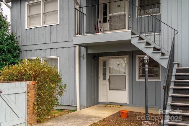 entrance to property with a balcony