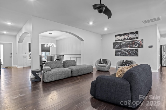 living room with dark wood-type flooring