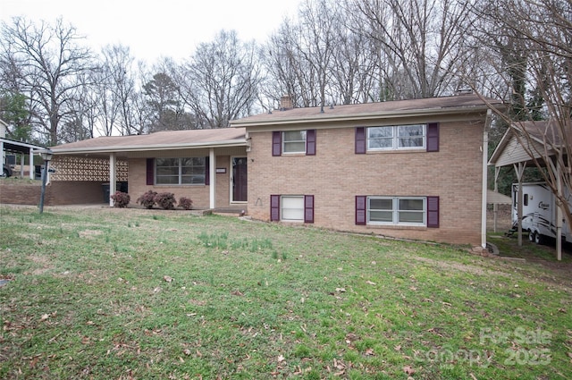 split level home featuring a front yard