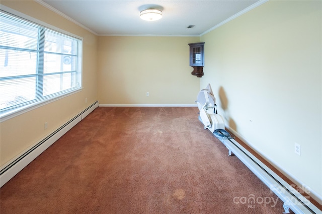 spare room featuring ornamental molding, carpet, and baseboard heating