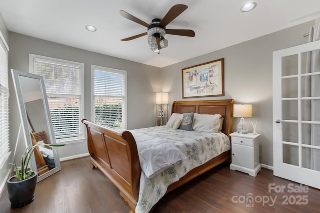 bedroom with dark wood-type flooring and ceiling fan