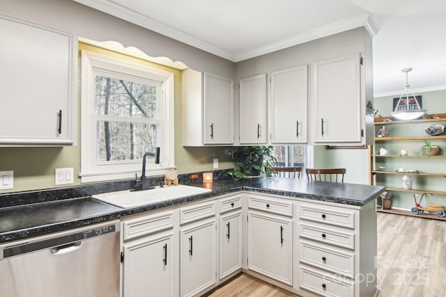 kitchen featuring sink, crown molding, dishwasher, kitchen peninsula, and white cabinets