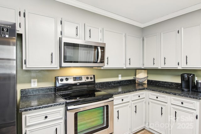 kitchen featuring ornamental molding, white cabinets, and appliances with stainless steel finishes