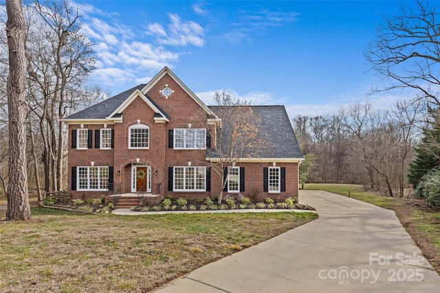 view of front of home with a front yard