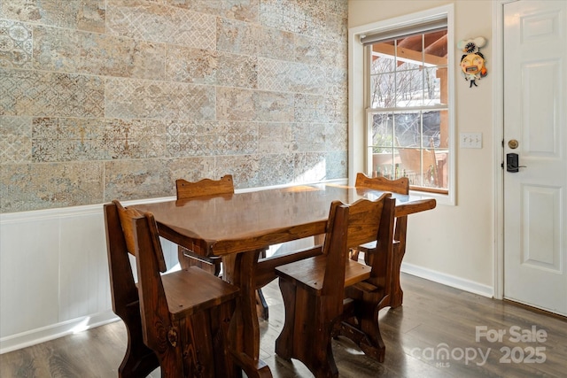 dining area featuring dark hardwood / wood-style flooring