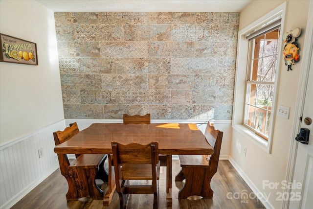 dining area with dark wood-type flooring